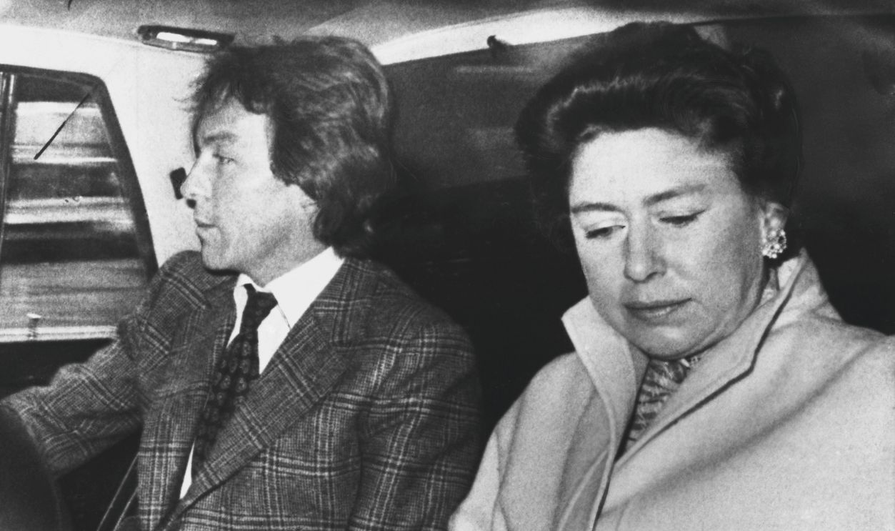 Princess Margaret and her companion Roddy Llewellyn on their way to Heathrow Airport before departing for a holiday in the Caribbean. 