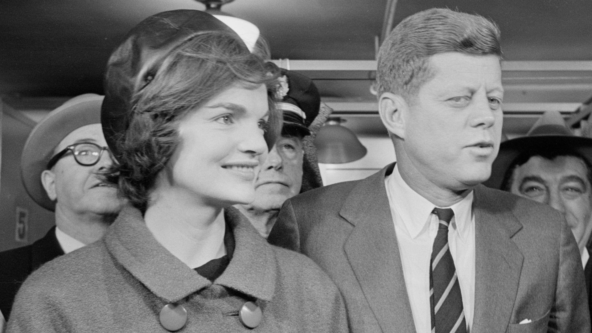 Senator John F. Kennedy with his wife Jacqueline Kennedy, voting in Boston at a public library, 1960