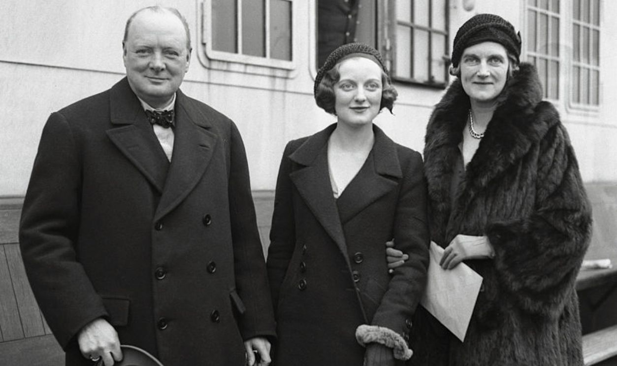 (Original Caption) Winston Churchill with his wife and daughter,Diana, on the S.S. Bremen when they arrived from England. Mr. Churchill will make a lecture tour of the United States.