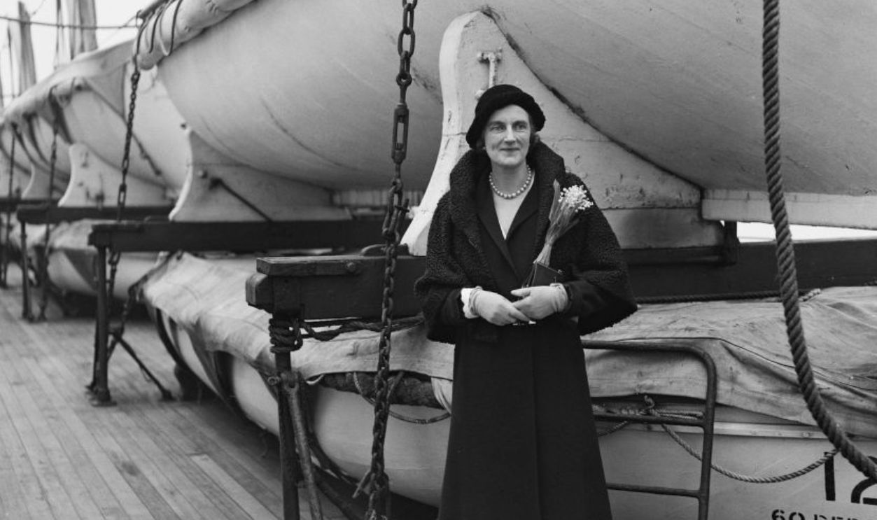 Clementine Churchill in front of lifeboats aboard RMS Berengaria, UK, circa 1925.