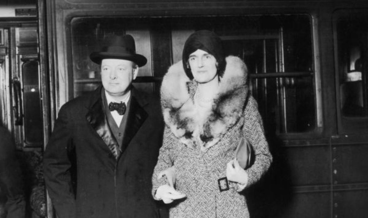 British statesman Winston Churchill (1874 - 1965) and his wife Clementine (1885 - 1977) arrive at Waterloo Station in London, after a visit to the United States, November 1929.