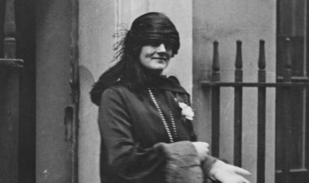 Clementine Churchill (1885 - 1977), the wife of Chancellor of the Exchequer Winston Churchill, leaves Downing Street to listen to her husband's budget speech of 1925.