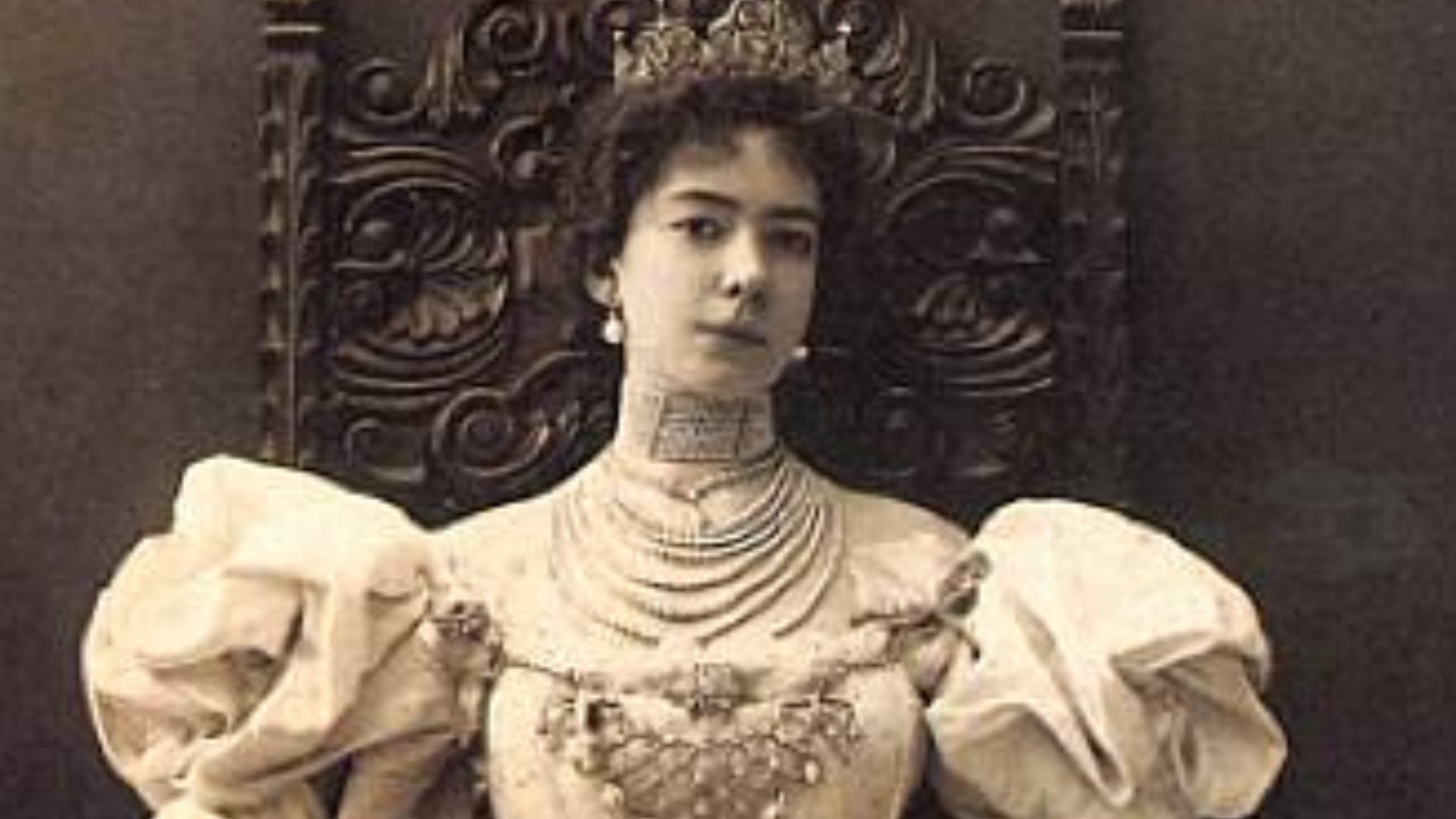 Olga de Meyer seated with Tiara