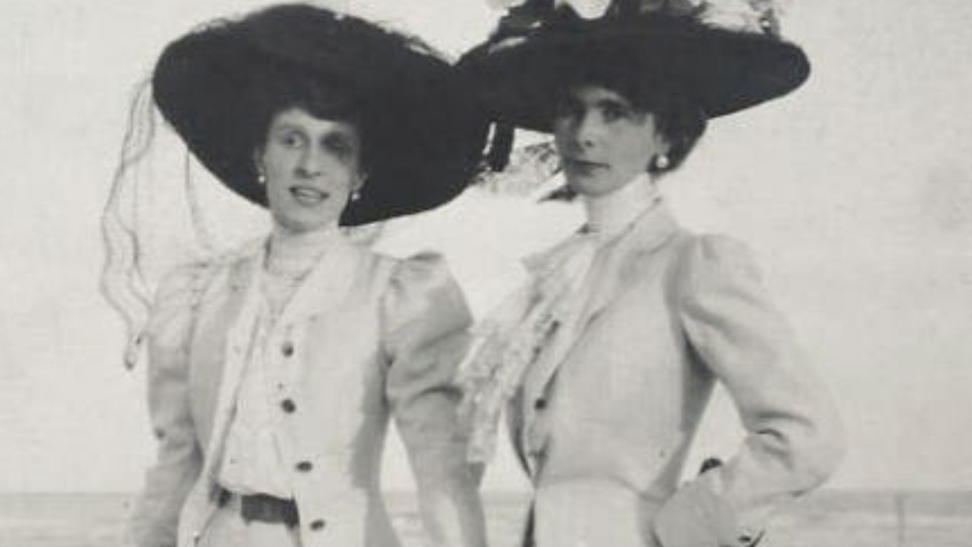 Two Women on Beach wearing large black hats 1900s (probably Olga de Meyer right)