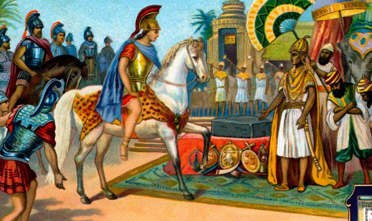 Getty Images - 173343407 - History of Iron: King Porus offering an iron bar to Alexander the Great. P: King of Paurava (region in present day Punjab, India). Reign: 340317 BC. Liebig collectible card series (French title: 'Histoire du fer'). 1914.