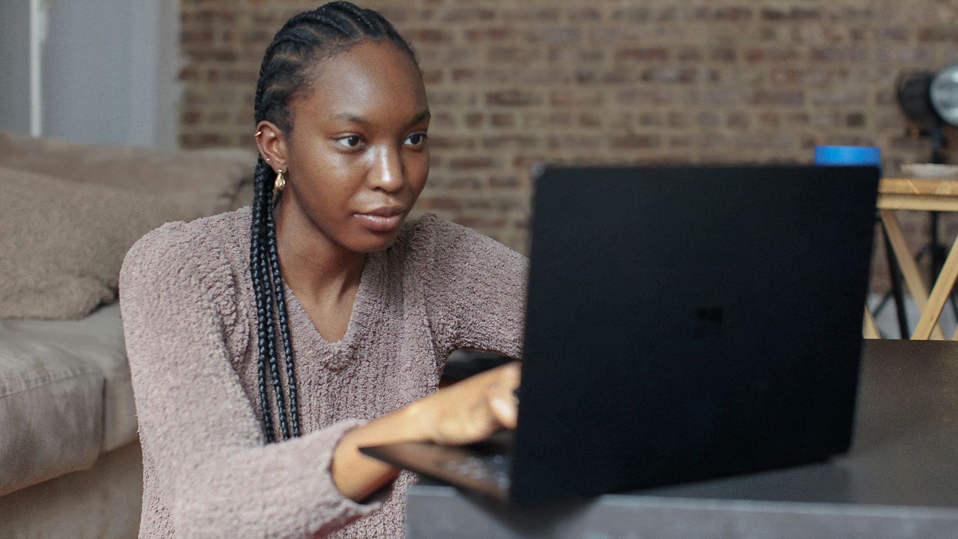 person using black Surface device