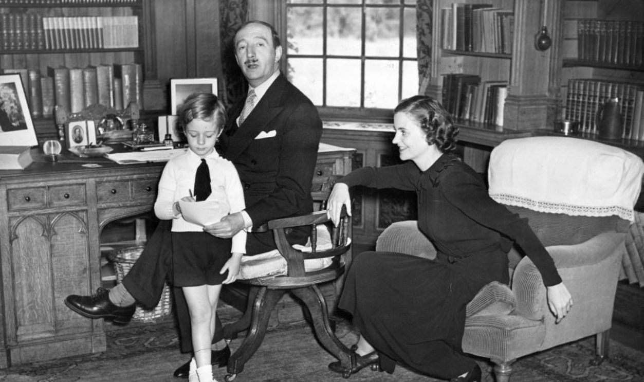 Zog I, The King Of Albania (1895 - 1961) was originally Ahmed Bey Zogu, the son of a Highland tribal chieftain. He is pictured with his family at home in London, where Prince Leka is getting some help with his arithmetic.