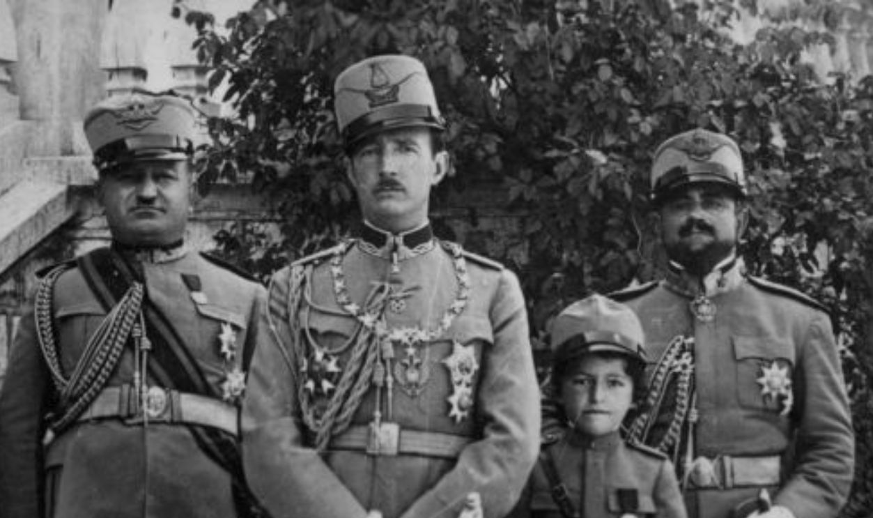 circa 1930: King Zog I of Albania (1895 - 1961, centre) with crown prince Vogal Esad, Colonel Saredgzi, General Aranita, General Ghilardi and Colonel Basha.