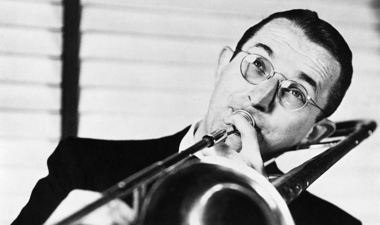 (Original Caption) Half length photograph of Tommy Dorsey playing the trombone. Undated photograph.
