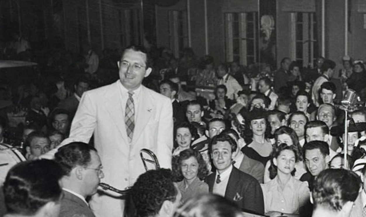 (Original Caption) Young crowd dancing to Tommy Dorsey's orchestra. Ca. 1939. Photograph.