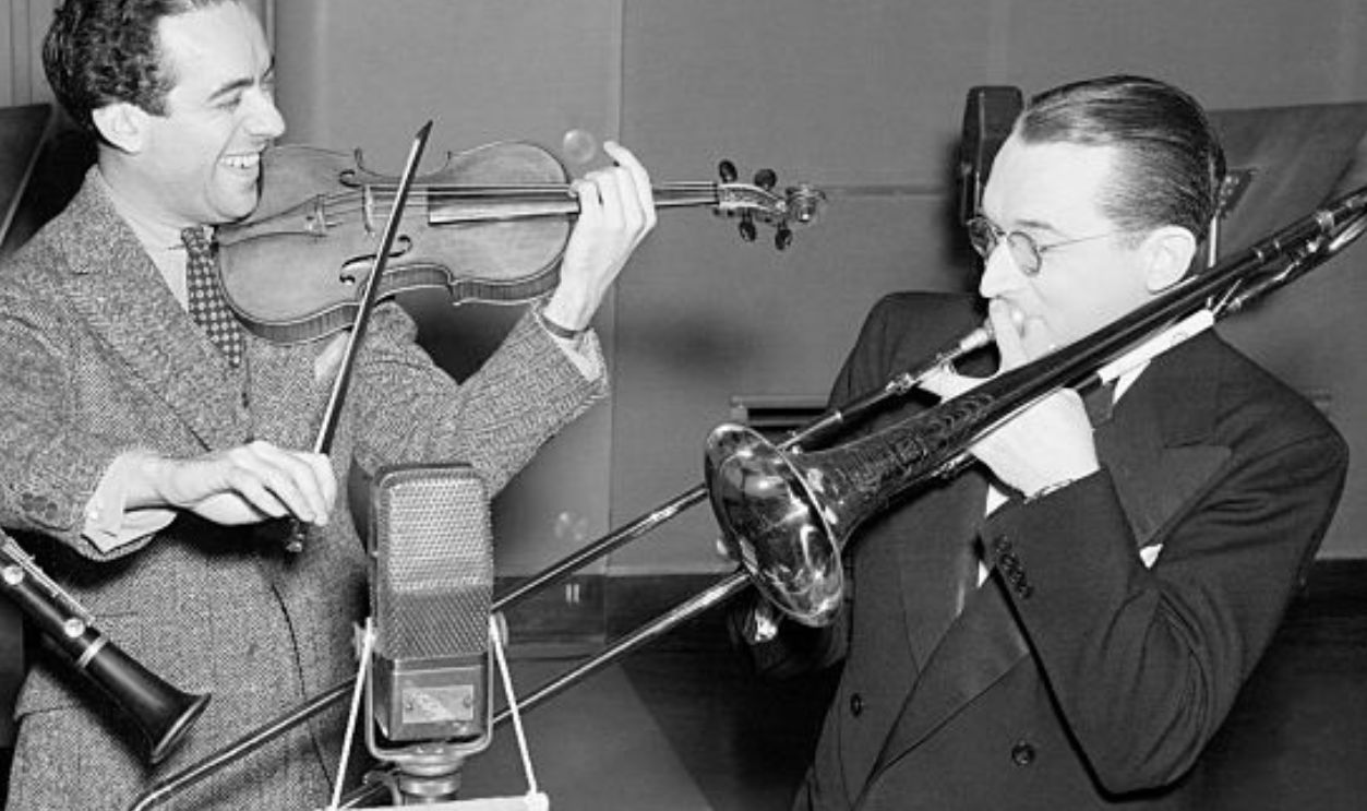(Original Caption) 3/17/1938-Philadelphia, PA- Noted orchestra leaders Buddy Rogers; Jan Savitt of KYW; and Tommy Dorsey (L-R) are pictured as putting on an impromtu 