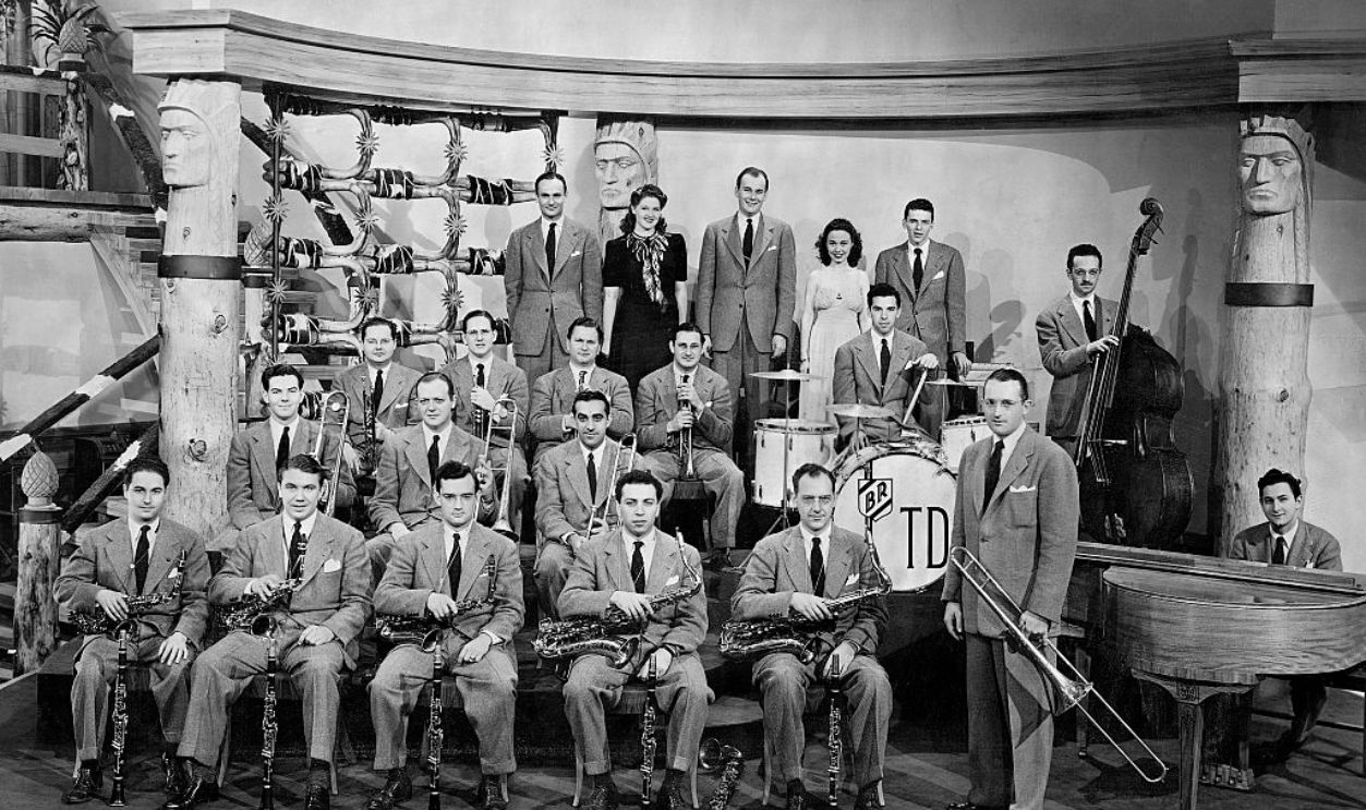 (Original Caption) 1941- Tommy Dorsey and his band. On the far right in the last row is a very young and yet unknown Frank Sinatra. Movie Still from, 
