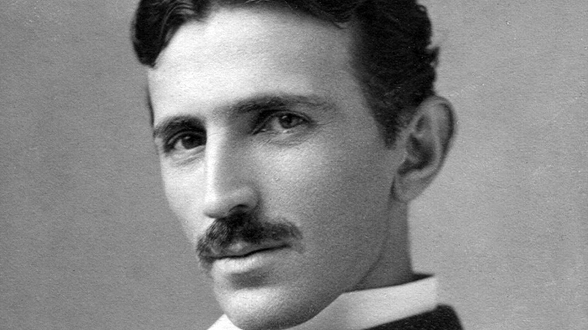 A photograph image of Nikola Tesla (1856-1943) at age 34.