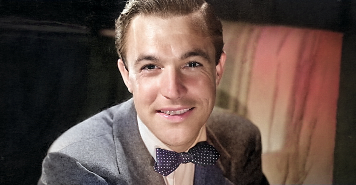 Gene Kelly smiling at the camera