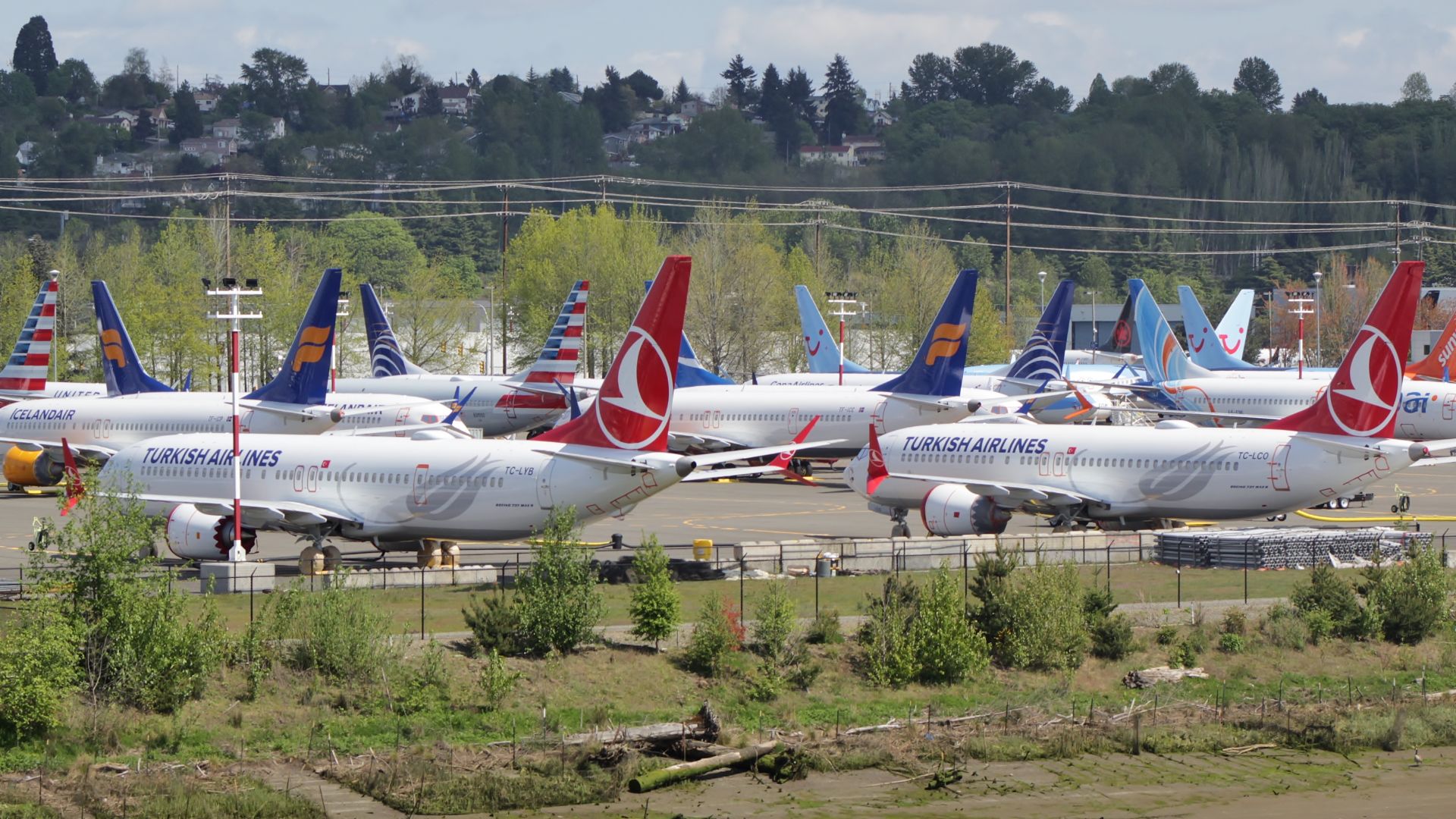 Undelivered Boeing 737 MAX aircraft that were grounded by aviation agencies, seen at parking lot at Boeing Field in Seattle, Washington. This picture was taken from the South Park Bridge.