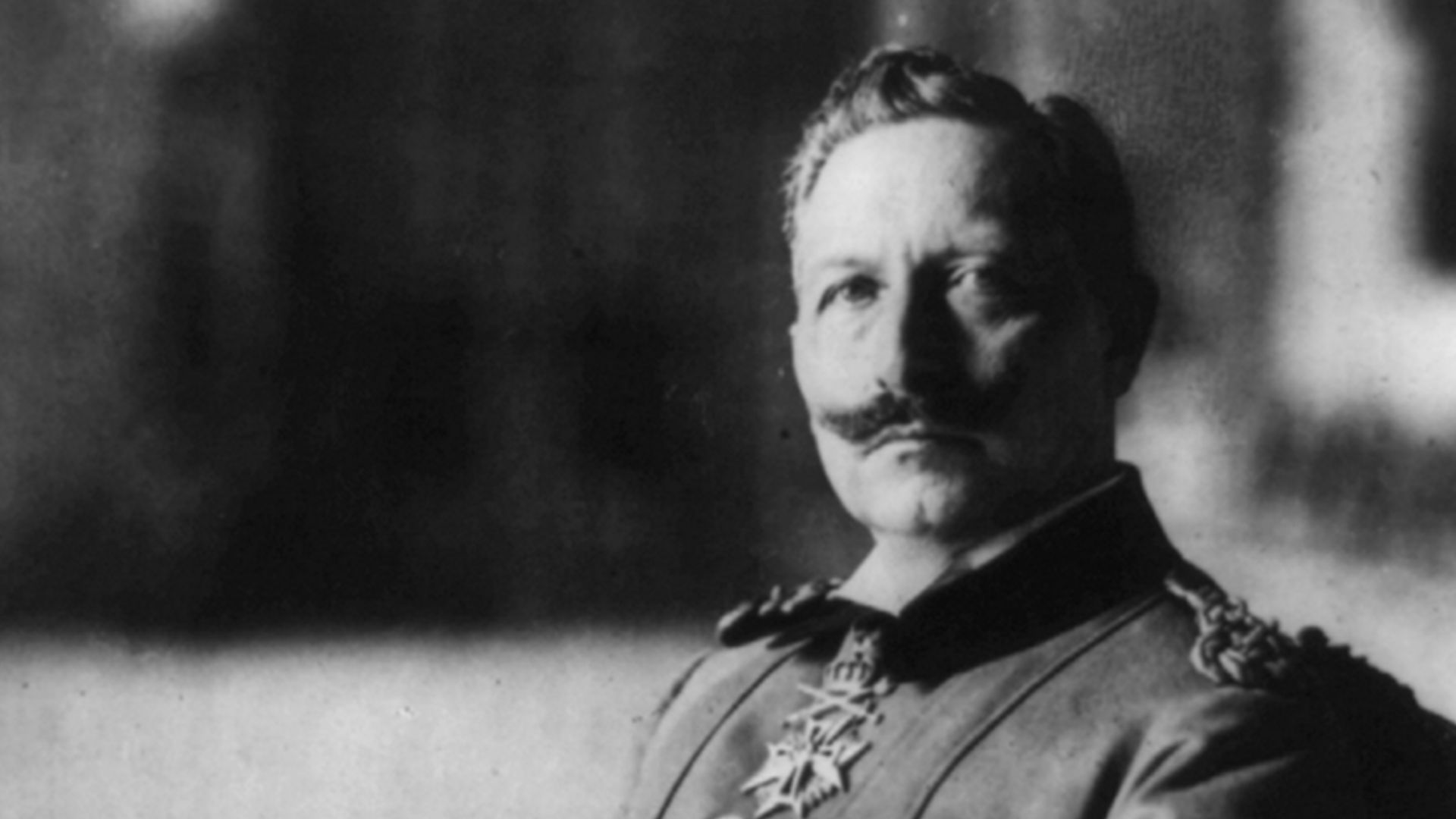 German emperor Wilhelm II, three-quarter length portrait, seated, facing left. (cropped)