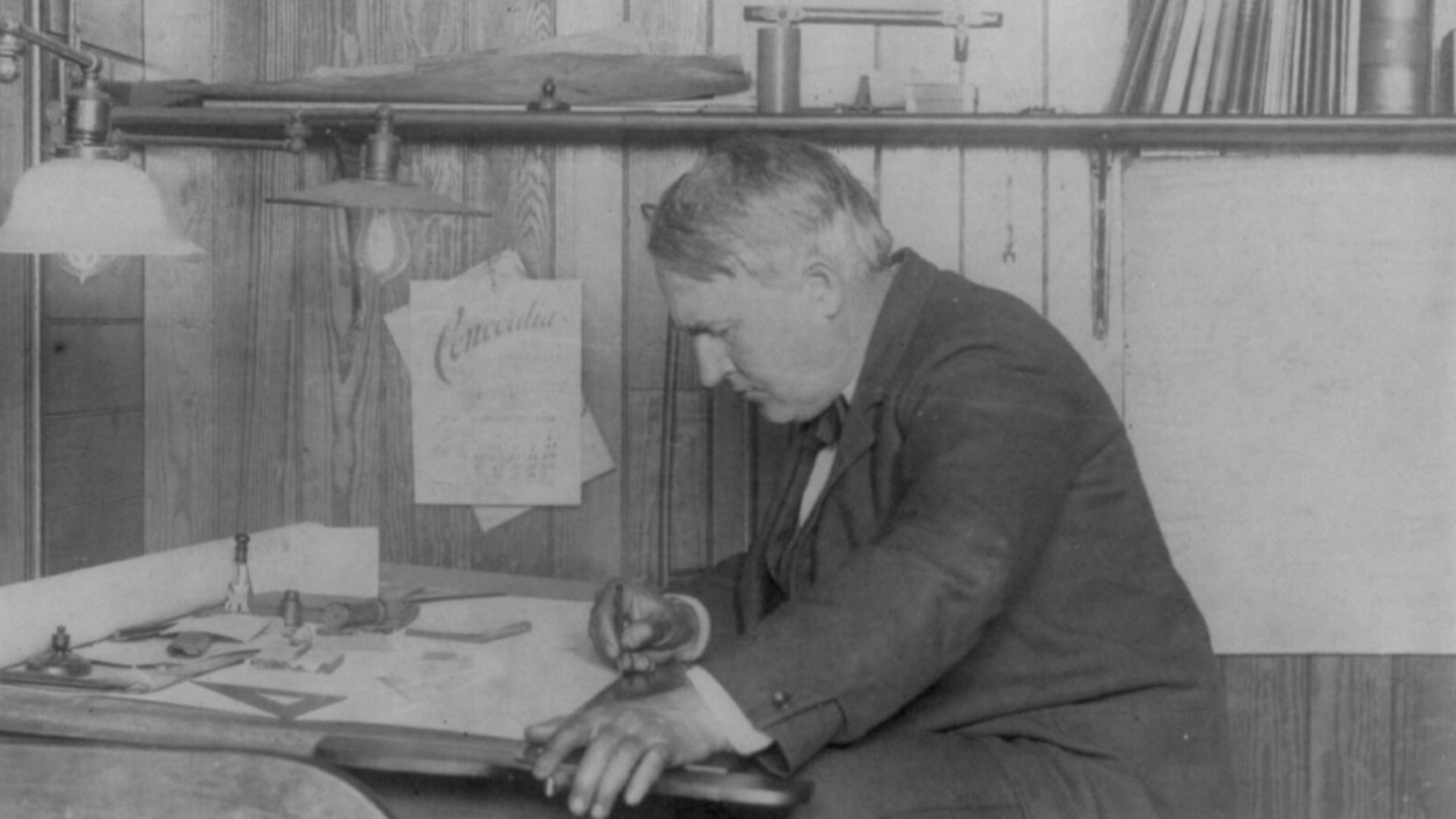 Title: Thomas Alva Edison, 1847-1931, left profile, seated at his desk, writing
Abstract/medium: 1 photographic print.