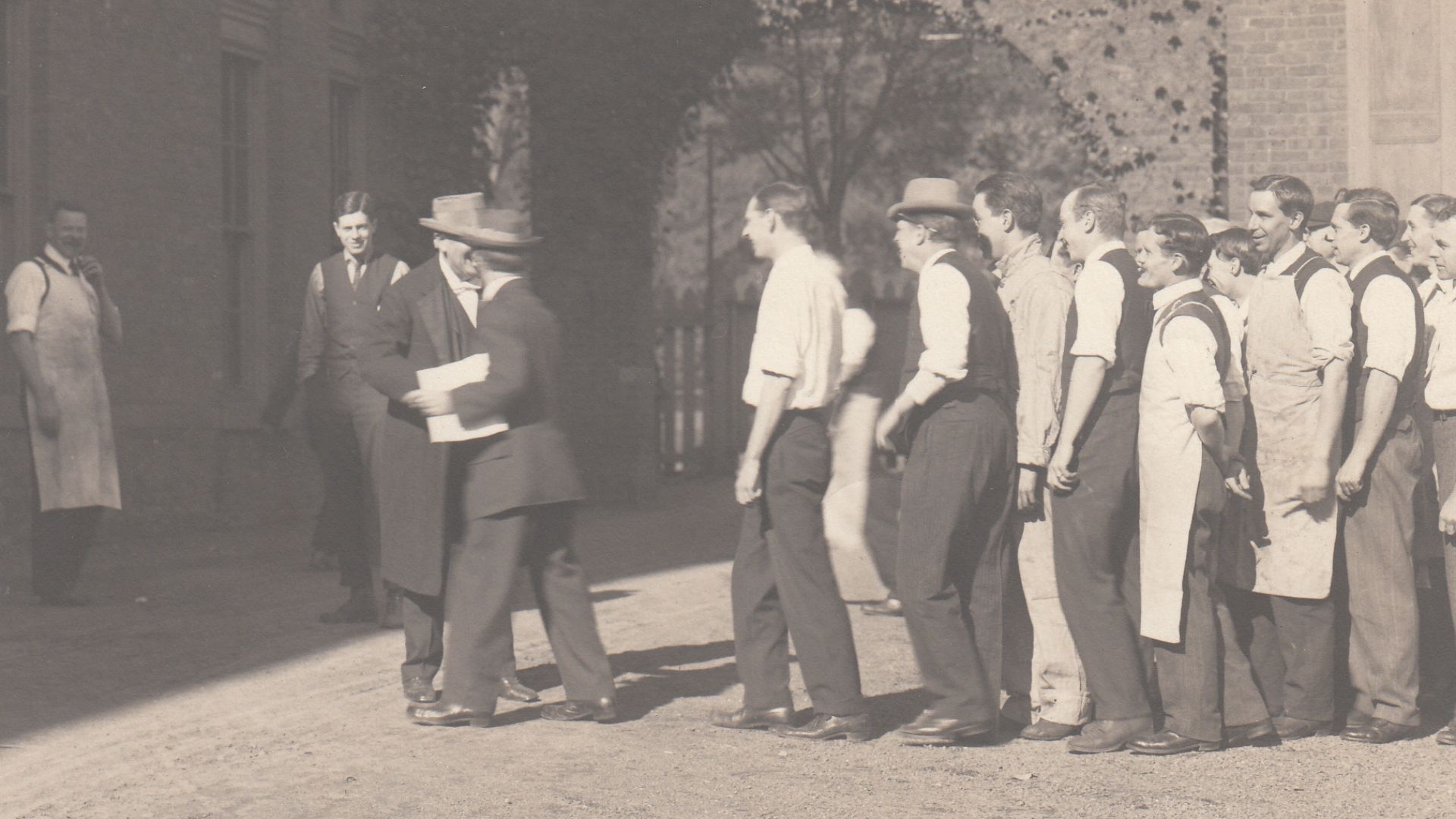 Thomas Edison being greeted by a group of lab employees upon his return from Europe.
Keywords: thomas edison; west orange; laboratory complex; building 5; building 5 exterior; ivy; main street; employees; courtyard; building 1; building 1 exterior; Edison
