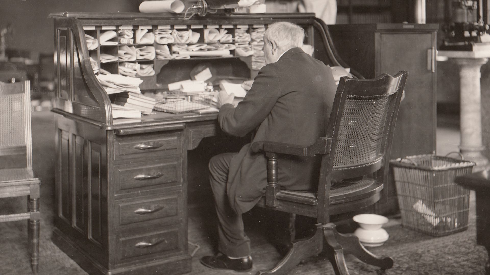 Thomas Edison at his desk.
Keywords: west orange; thomas edison; laboratory complex; building 5; building 5 interior; building 5 library; Edison; Thomas A.; (EDIS Historical Photo Series Name)