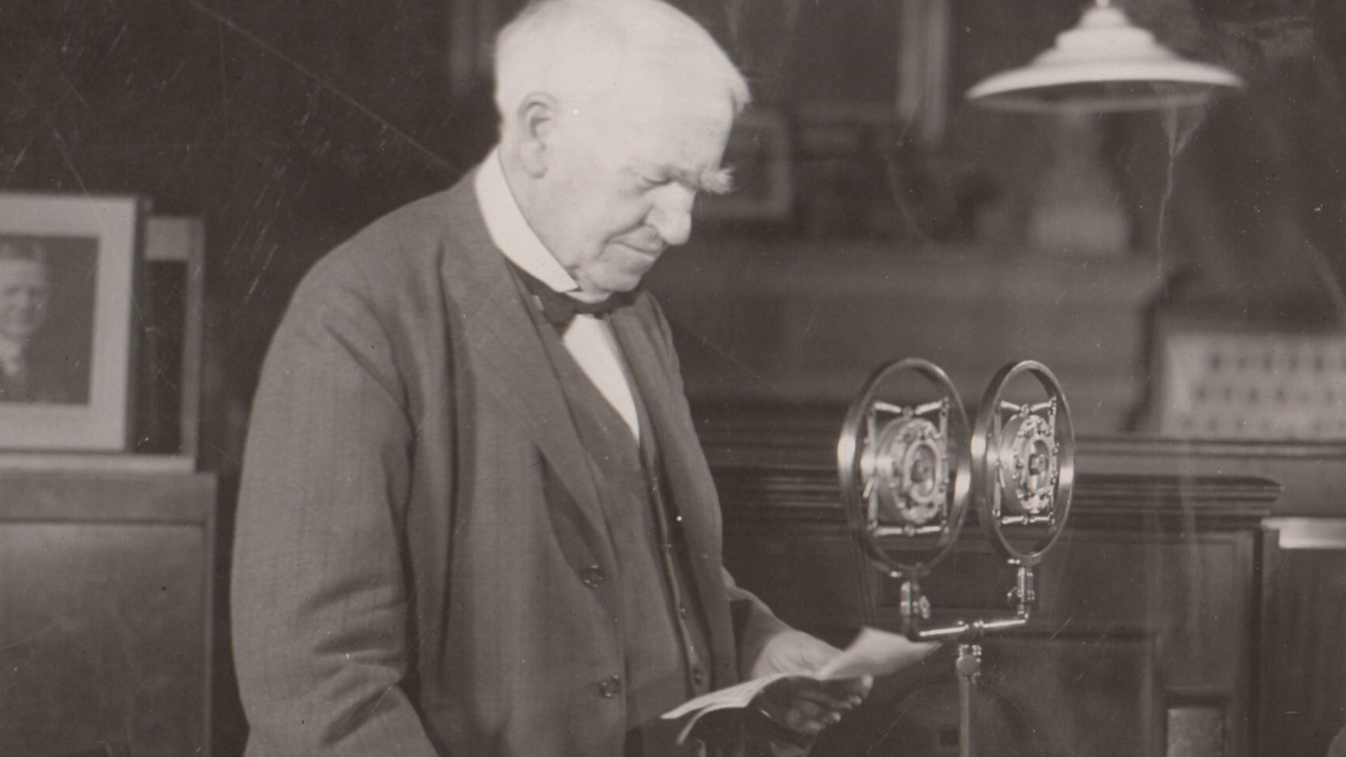 Charles Edison with Thomas Edison in the Building 5 Library who is broadcasting to Schenectady, New York, on the occasion of a plaque dedication at the first General Electric building there.
Keywords: thomas edison; charles edison; family; west orange; la