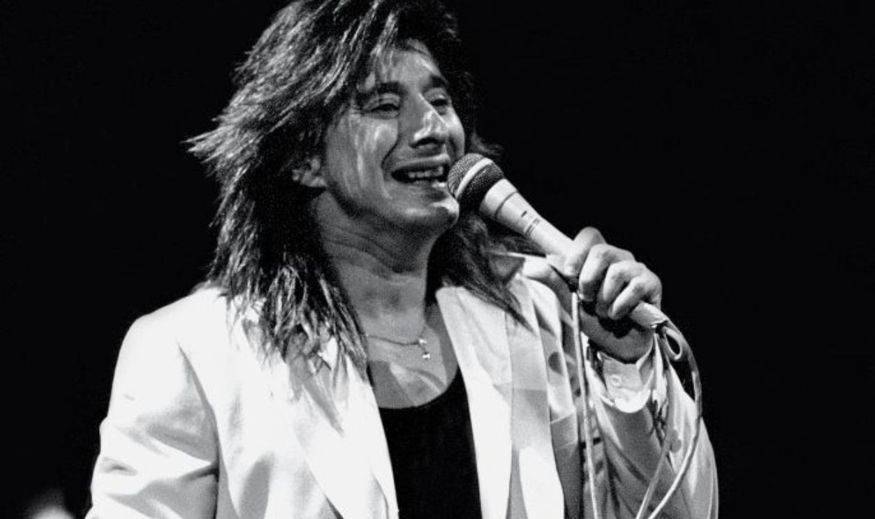 Singer and songwriter Steve Perry is shown performing on stage during a live concert appearance with Journey on November 3, 1986 in Hartford, Connecticut.