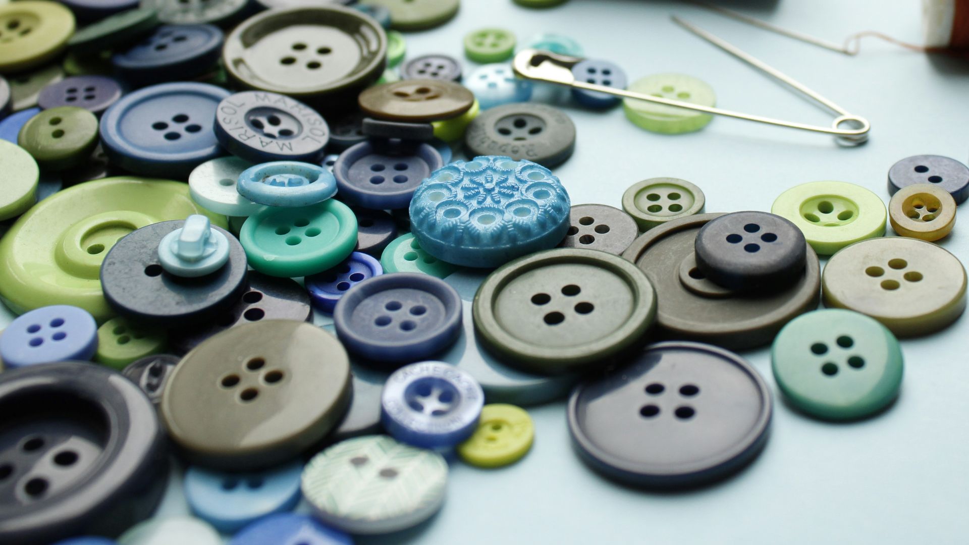 blue and white buttons with blue and red buttons