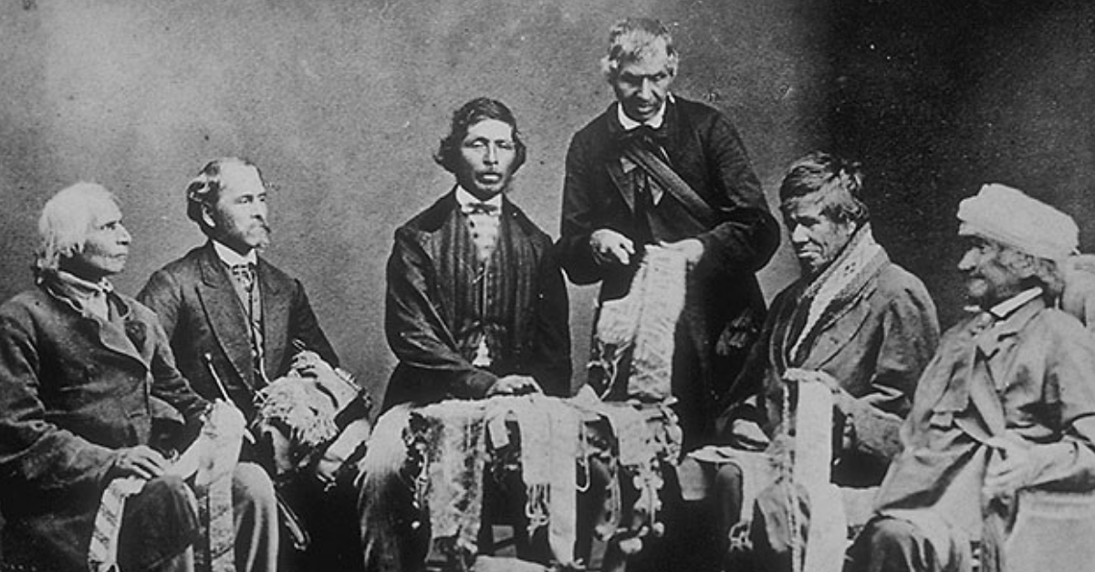 Iroquois Chiefs from the Six Nations Reserve reading Wampum belts in Brantford, Ontario