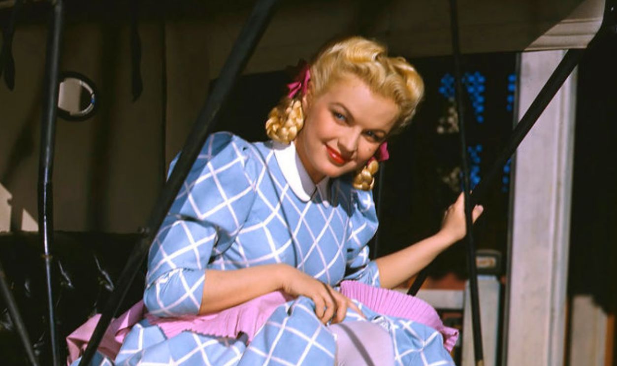 American actress, singer and dancer, June Haver in a western buggy, circa 1945.