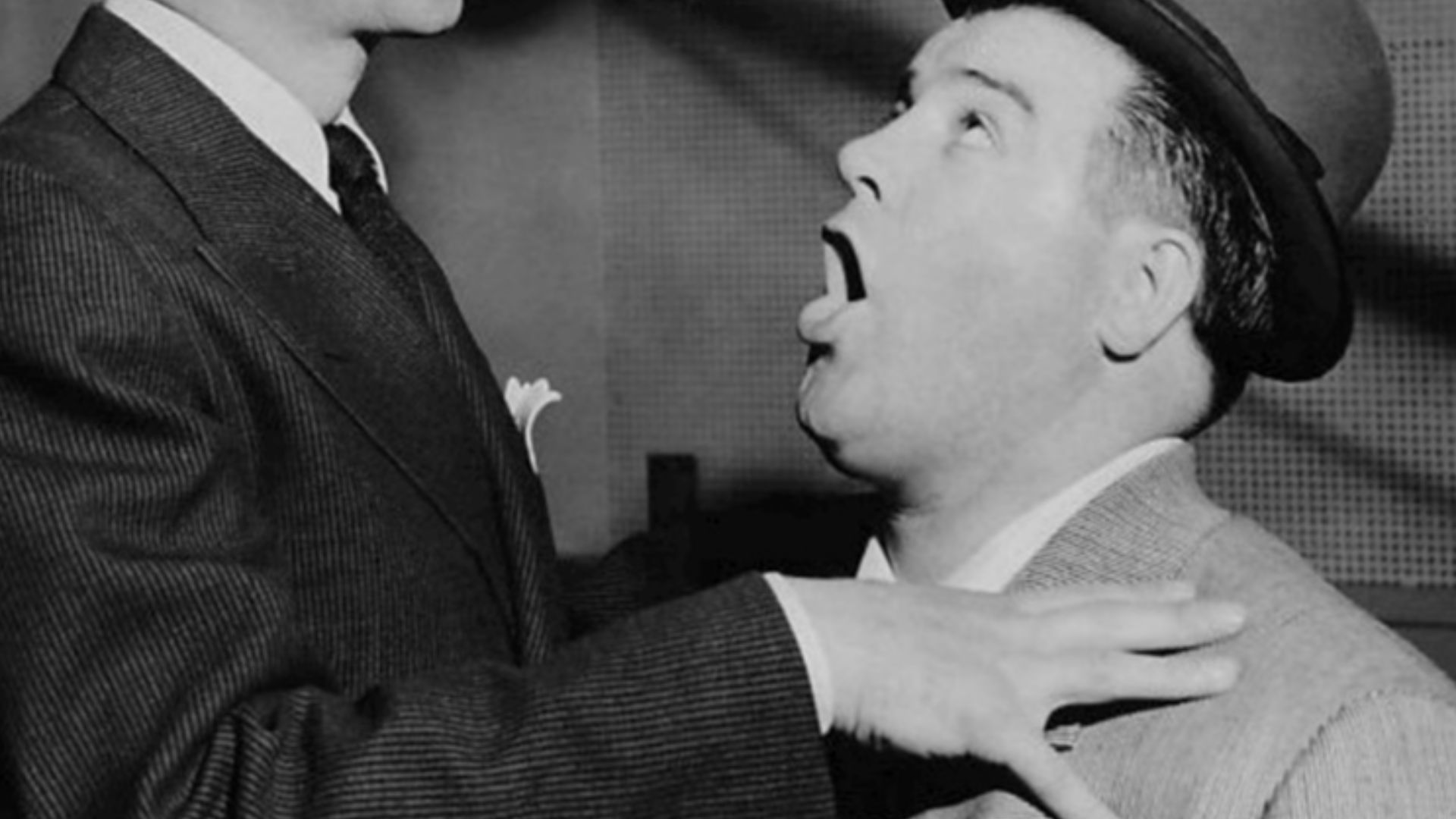 Photo of Bud Abbott and Lou Costello in the NBC radio studios.