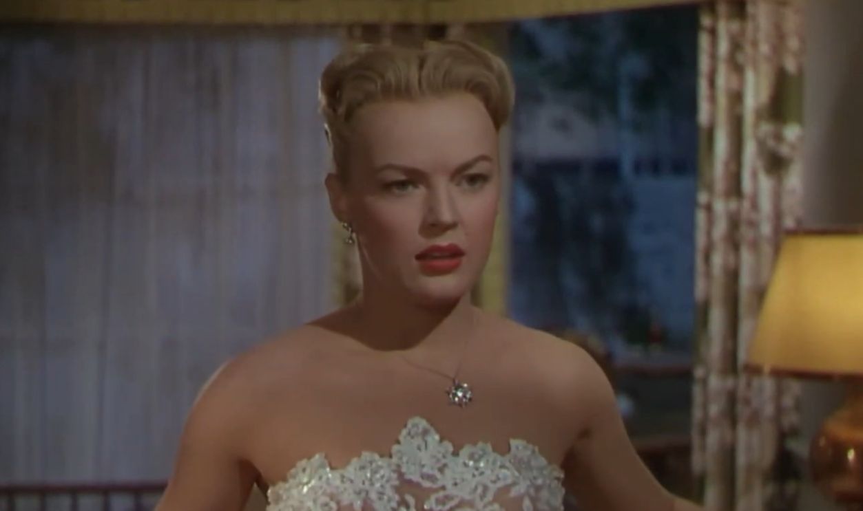 Screenshot from The Girl Next Door (1953)