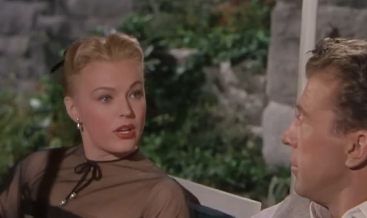 Screenshot from The Girl Next Door (1953)
