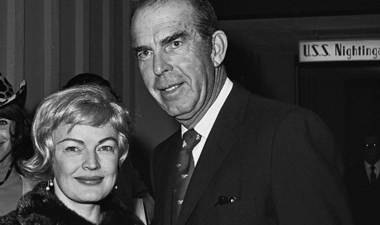 American actress, singer and dancer June Haver, wearing a fur coat, and her husband, American actor Fred MacMurray, who wears a dark blazer over a shirt and tie, attend an event during the Andy Williams San Diego Open at Torrey Pines Golf Course in San Diego, California, 23rd January 1970.