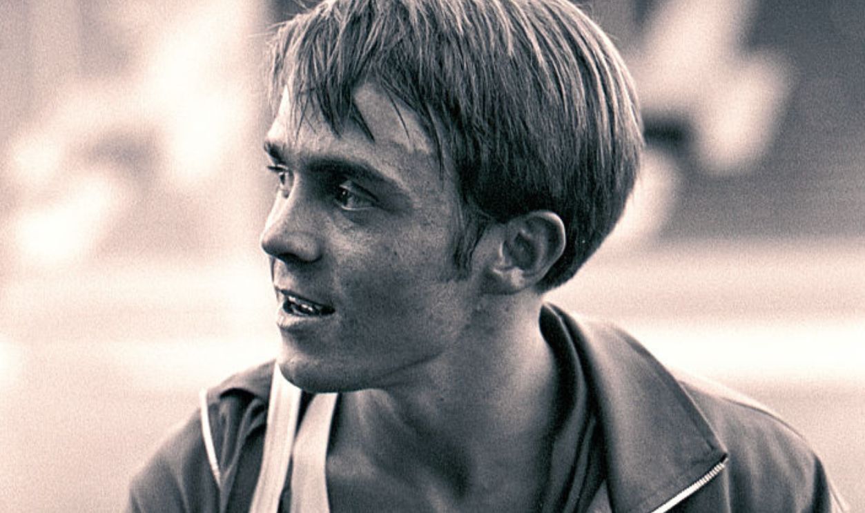 EUGENE, OREGON - JUNE 1970: University of Oregon distance runner Steve Prefontaine talks with supporters surrounding a race at the university's Hayward Field in Eugene, Oregon in June of 1970. Prefontaine later set the American record for the 5,000 meters at the 1972 Olympic Trials and competed in the 1972 Olympic Games in Munich, Germany. He died in a tragic single-car auto accident in 1975.