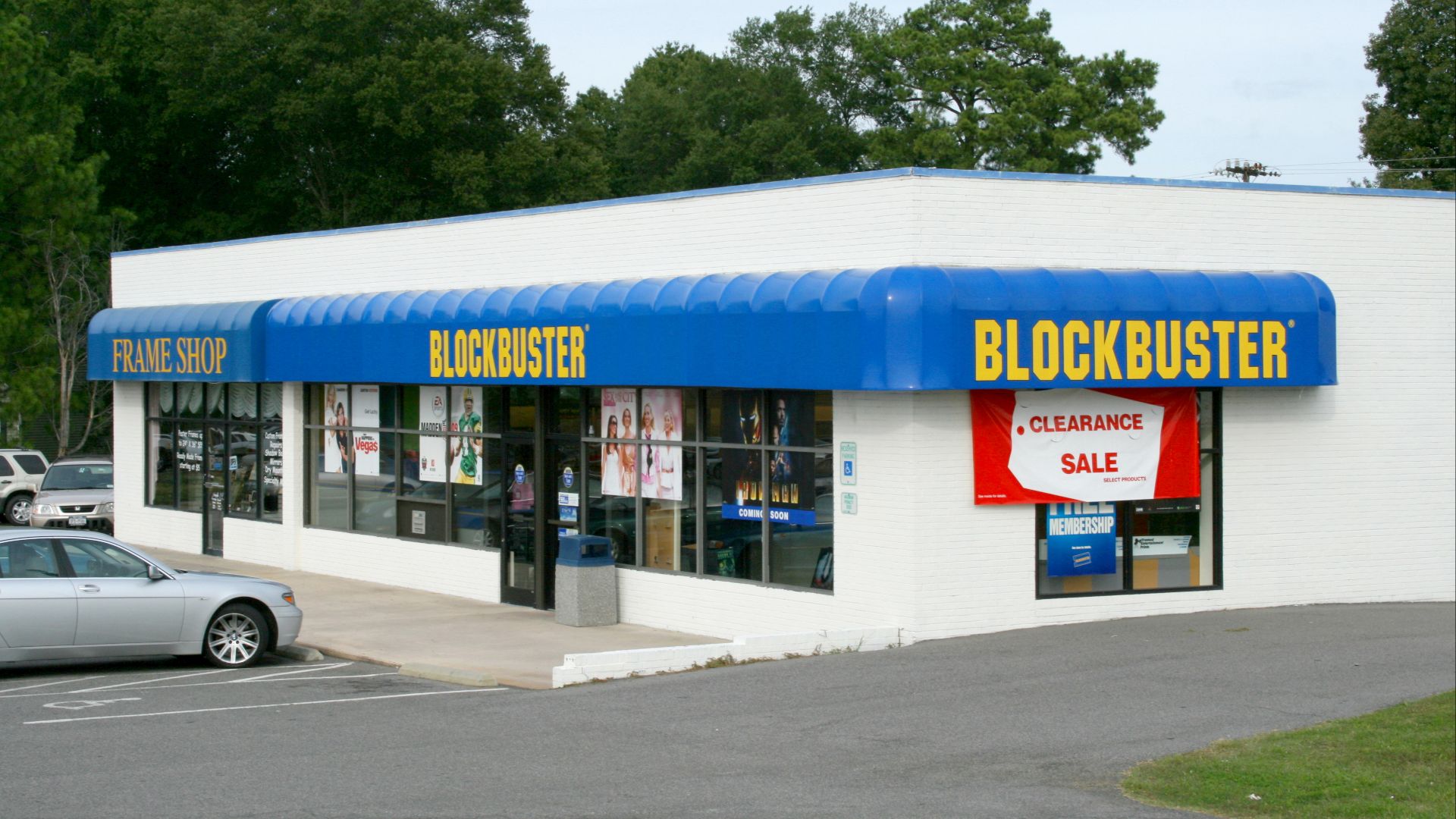 Blockbuster outlet at 3438 Hillsborough Road in Durham, North Carolina.  It shares a building with a Frame Shop.