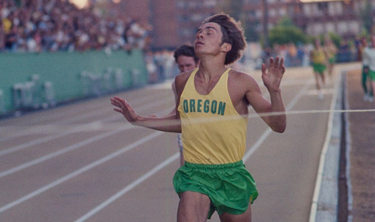 EUGENE, OREGON - JUNE 1970: University of Oregon distance runner Steve Prefontaine crosses the finish line in a race at the university's Hayward Field in Eugene, Oregon in June of 1970. Prefontaine later set the American record for the 5,000 meters at the 1972 Olympic Trials and competed in the 1972 Olympic Games in Munich, Germany. He died in a tragic single-car auto accident in 1975.