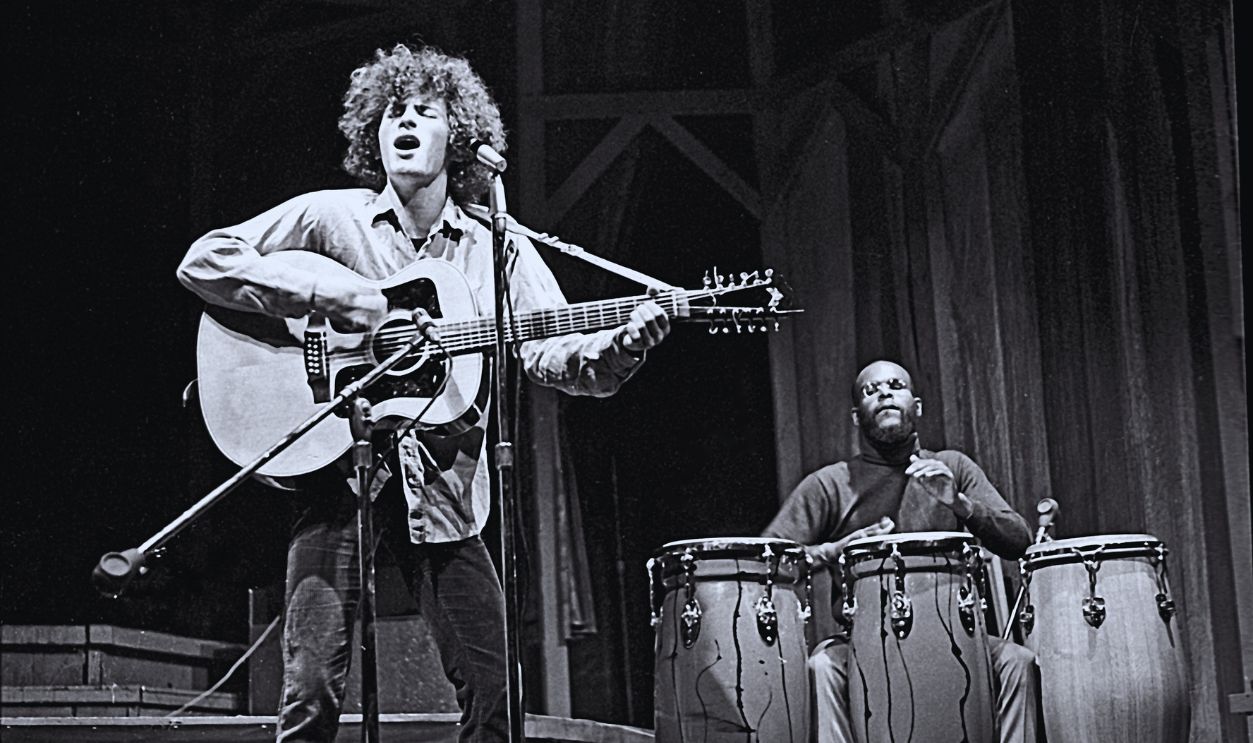 Gettyimages - 73989844, Performing At The Bitter End NEW YORK - NOVEMBER 14: Singer/songwriter Tim Buckley performs onstage with conga player Carter C.C. Collins at the Bitter End night club in Greenwich Village in New York City, New York on November 14, 1967. 