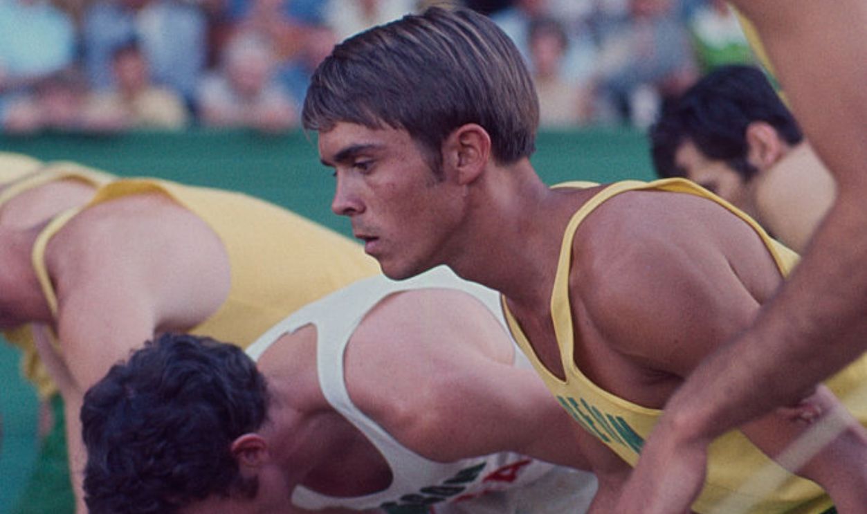 EUGENE, OREGON - JUNE 1970: University of Oregon distance runner Steve Prefontaine waits at the starting line of a race at the university's Hayward Field in Eugene, Oregon in June of 1970. Prefontaine later set the American record for the 5,000 meters at the 1972 Olympic Trials and competed in the 1972 Olympic Games in Munich, Germany. He died in a tragic single-car auto accident in 1975.
