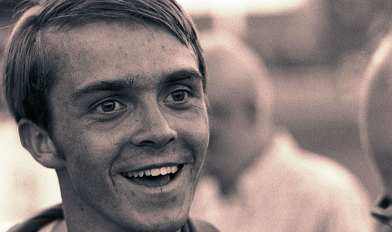 EUGENE, OREGON - JUNE 1970: University of Oregon distance runner Steve Prefontaine smiles while talking with supporters surrounding a race at the university's Hayward Field in Eugene, Oregon in June of 1970. Prefontaine later set the American record for the 5,000 meters at the 1972 Olympic Trials and competed in the 1972 Olympic Games in Munich, Germany. He died in a tragic single-car auto accident in 1975.