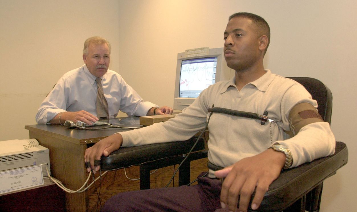 A computerized polygraph machine being used in a simulated situation by the County Police. 