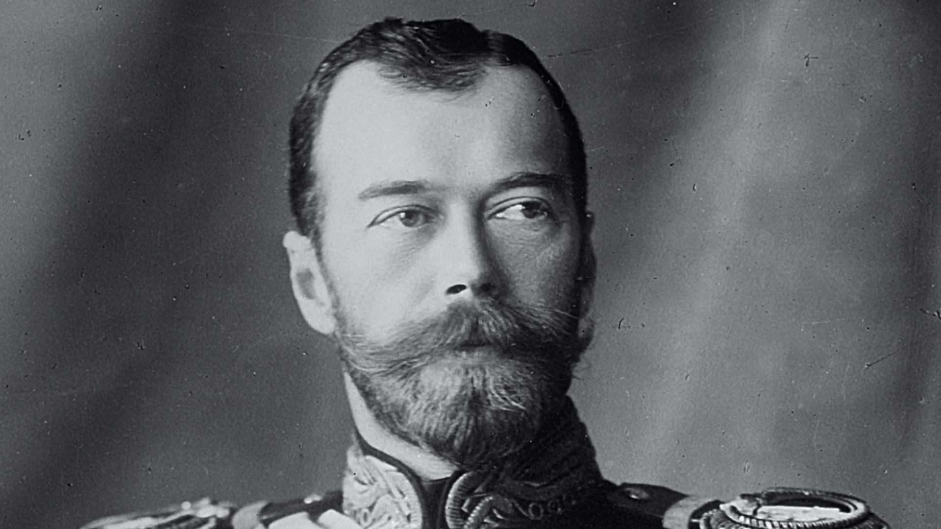 Photograph of Nicholas II. Image  cropped and subjected to the following changes  (decreased brightness, increased contrast, decreased highlights, increased shadowing) using Photo Editor at https://www.befunky.com/create/.