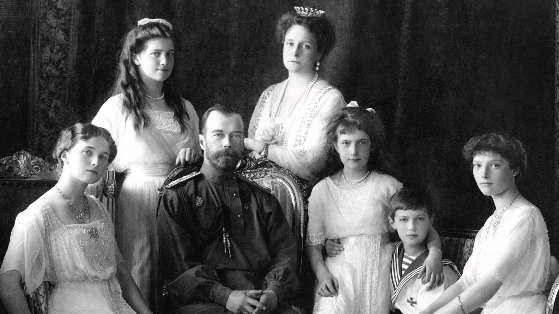 Nicholas II of Russia with the family (left to right): Olga, Maria, Nicholas II, Alexandra Fyodorovna, Anastasia, Alexei, and Tatiana. Livadiya, Crimea, 1913. Portrait by the Levitsky Studio, Livadiya. Today the original photograph is held at the Hermitag