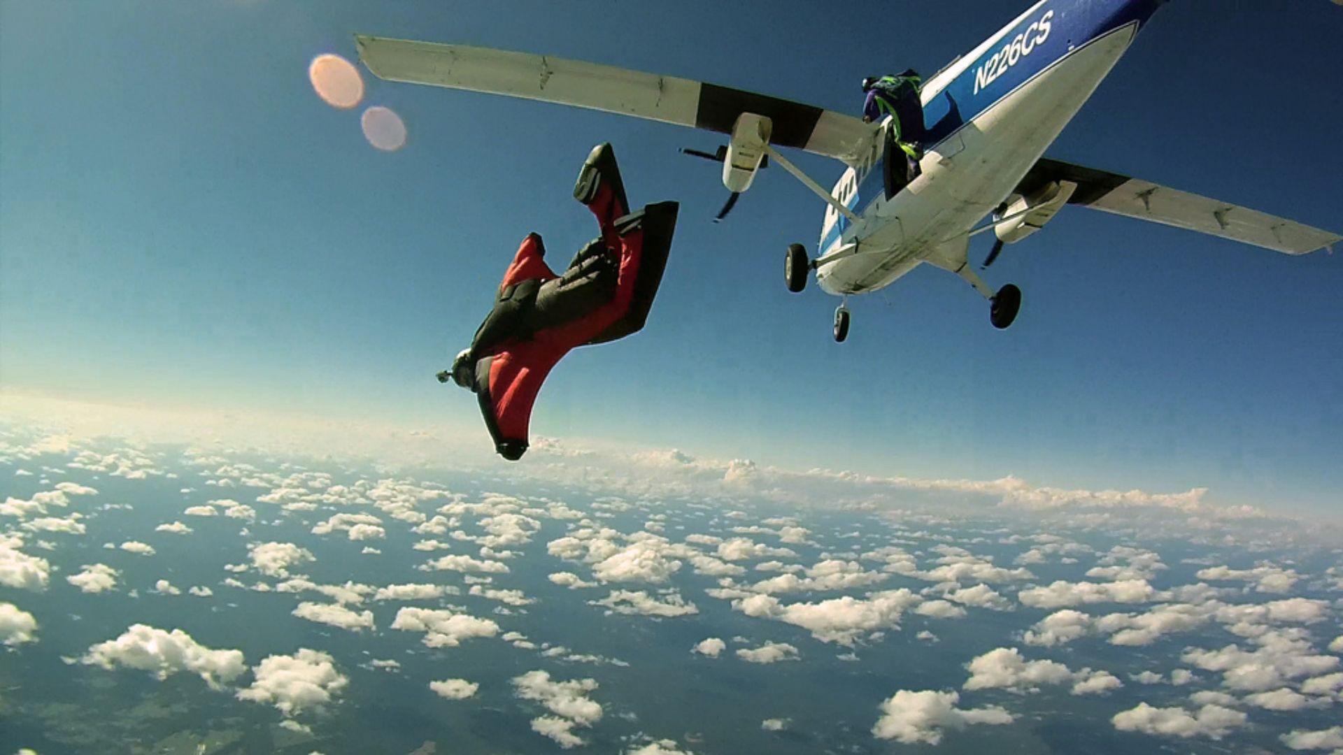 Red Wingsuit Exit.