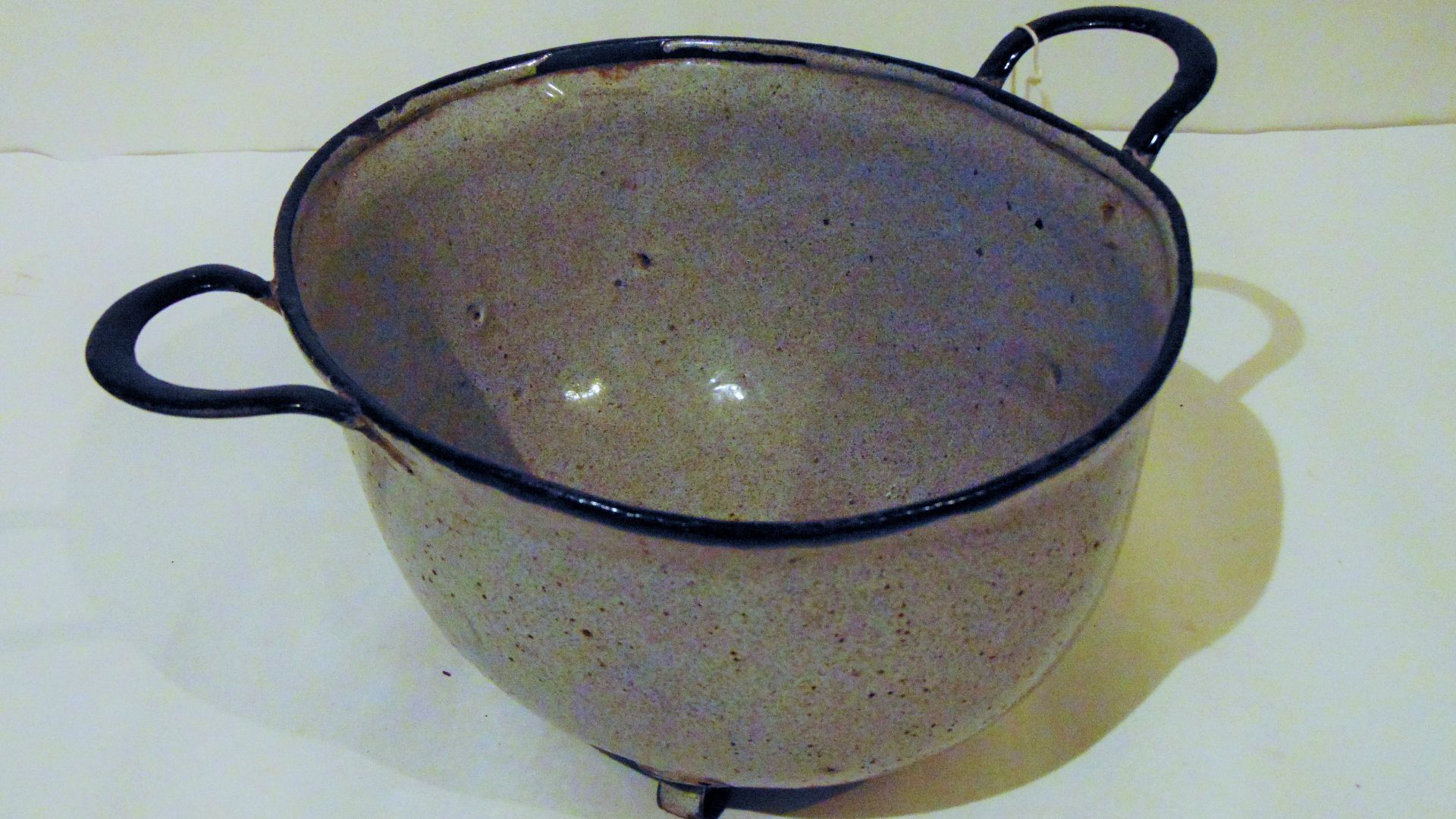 Enamelled German helmet with handles intended for use as a chamber pot. Sold by Dutch store Hema shortly after the end of the Second World War. Visual pun on the word ‘jerry’. 
Photographed in the collection of the National Liberation Museum 1944-1945, th