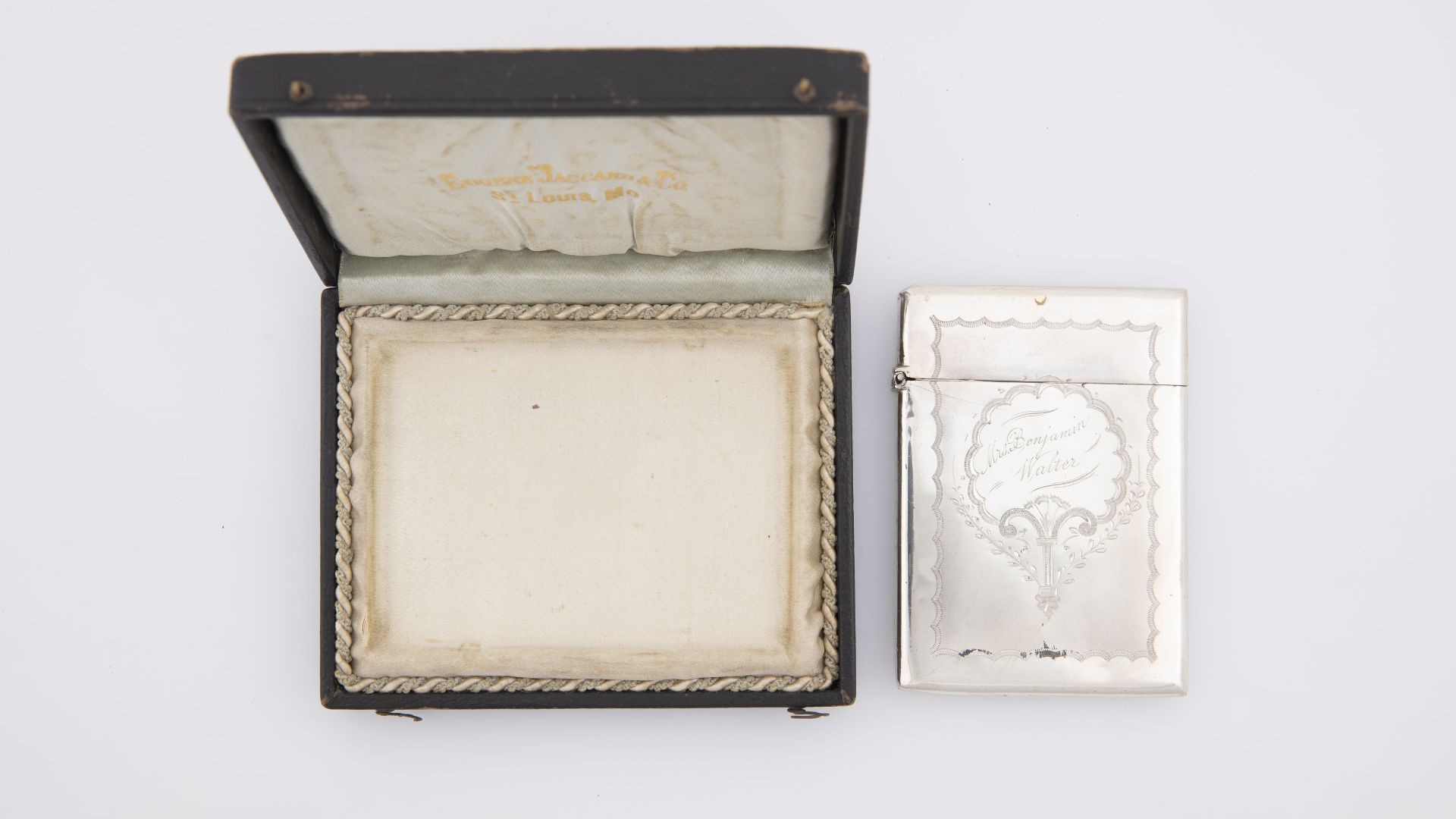 Silver calling card case with the original leather box made by the Eugene Jaccard Co. in St. Louis. It most likely dates between 1872 and 1880 and belonged to Mrs. Jennie Walter.