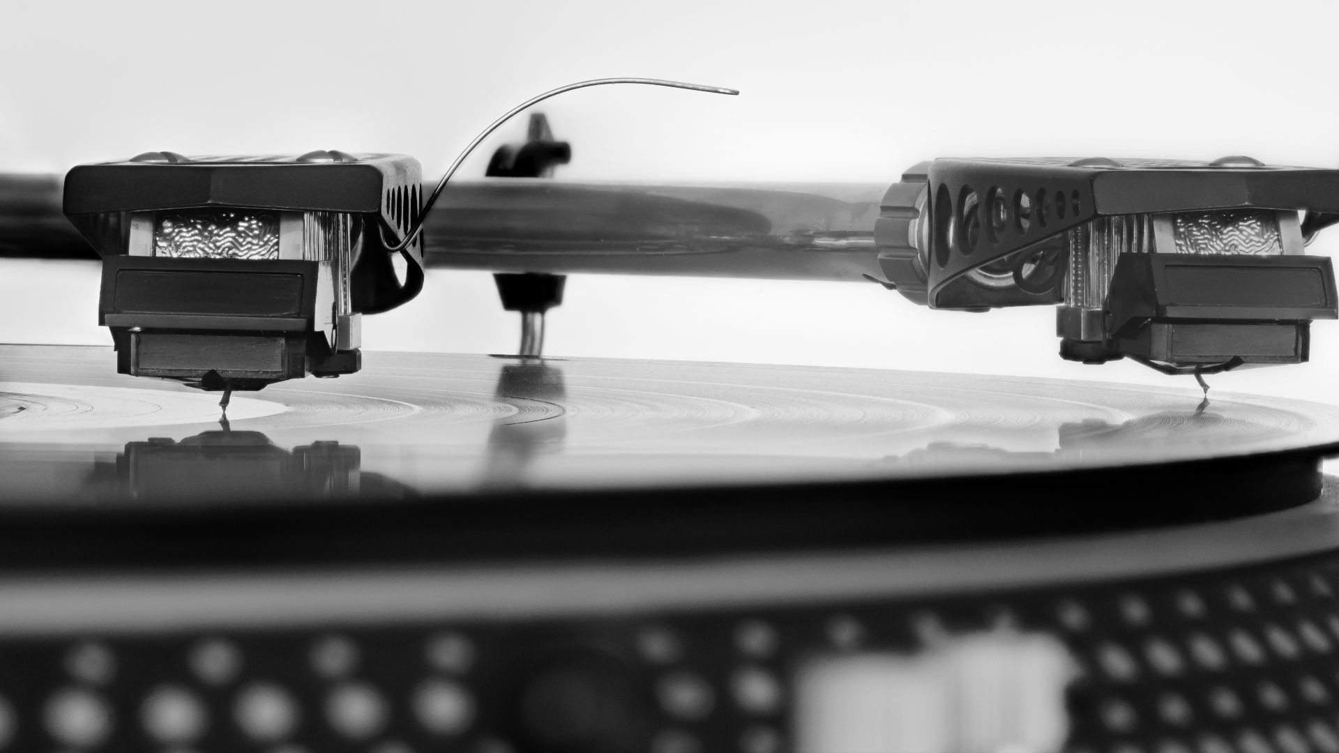Technics SL-1200 with SME model 3009 series II improved pick-up arm and 
Shure V-15 type III Stereo Dynetic Phonograph Cartridge. This image displays both the initial and final positions of the pick-up cartridge with the stylus below resting in the record