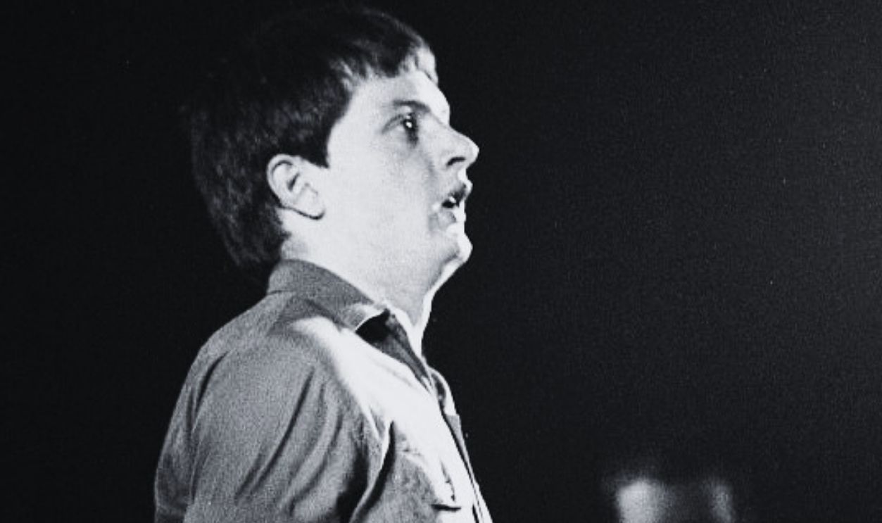 UNITED KINGDOM - FEBRUARY 29: LYCEUM Photo of Ian CURTIS and JOY DIVISION, Ian Curtis, with Peter Hook behind, performing live onstage