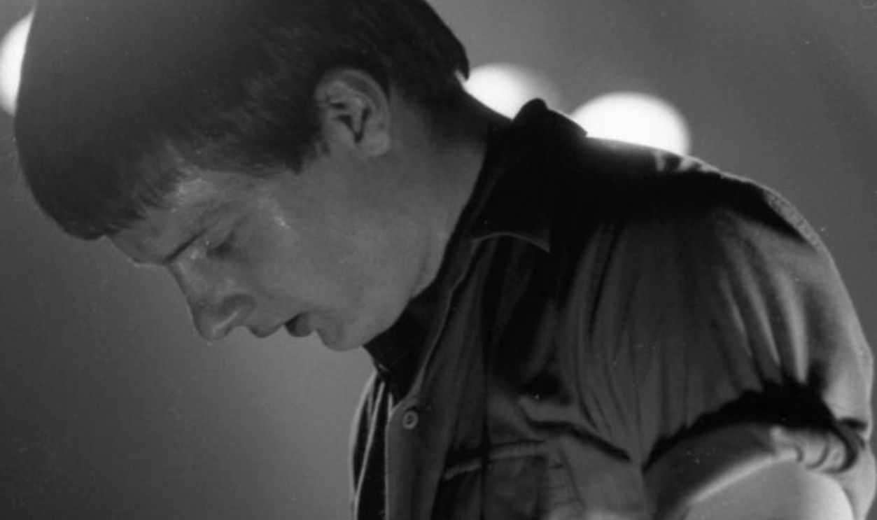 British musician Ian Curtis (1956 - 1980) of the group Joy Division performs onstage at the Lyceum, February 29, 1980.