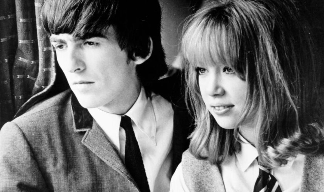 LONDON - AUGUST 11: George Harrison of the rock and roll band 'The Beatles' with actress Patti Boyd (whom he would later marry) in a still from the movie 'A Hard Day's Night' which was released on August 11, 1964.