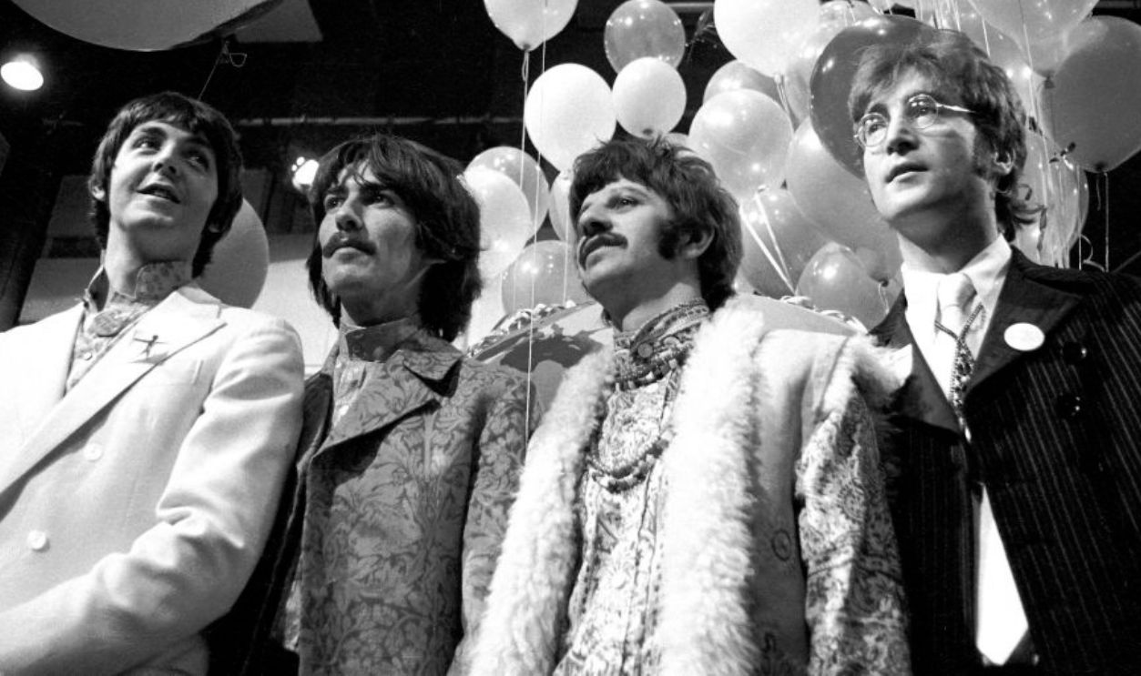 From left, Paul McCartney, George Harrison (1943-2001), Ringo Starr and John Lennon (1940-1980) of English rock and pop group The Beatles pose together during a press call to promote their performance of the song 'All You Need Is Love' as part of the 'Our World' worldwide satellite broadcast, at Abbey Road Studios in London, 24th June 1967. The band would perform the song live on a global television link up the next day, 25th June. 