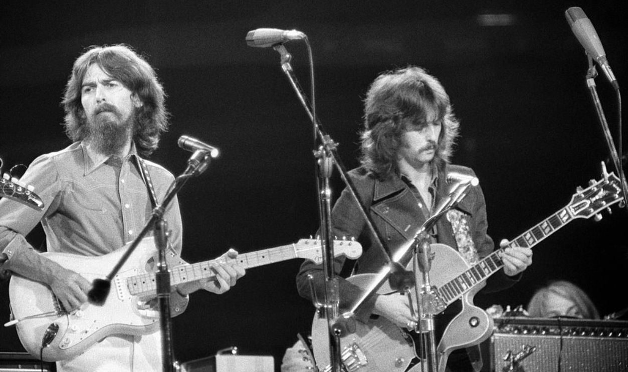 George Harrison and Eric Clapton performing at the Concert for Bangladesh at Madison Square Garden.